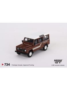   Minigt - 1:64 Land Rover Defender 110 County Station Wagon Russet Brown 1985 (LHD) - MINI GT